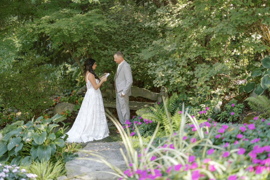 wedding couple reading their own to each other privately